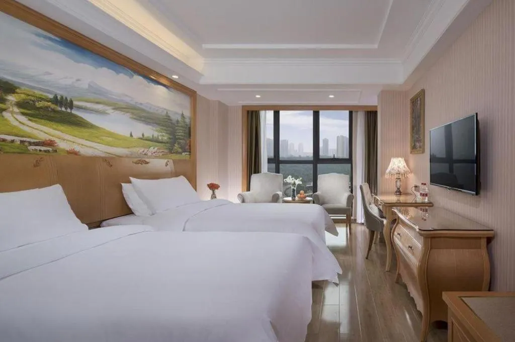 Bed in Vienna Hotel Chongqing West Station Southwesten Hospital