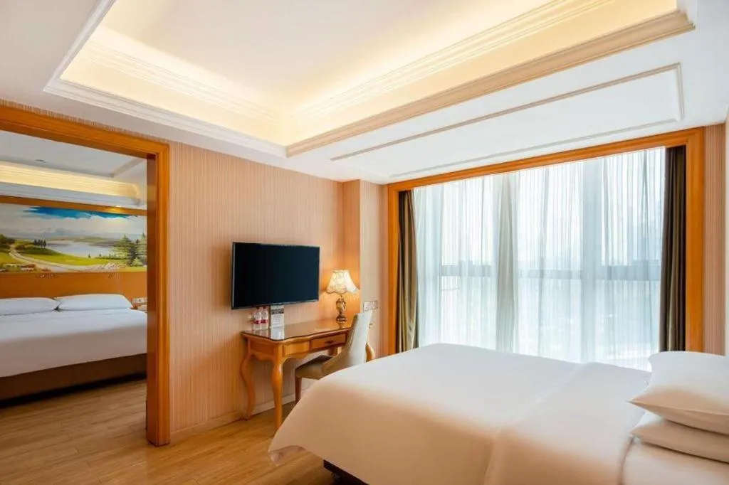 Bed in Vienna Hotel Chongqing West Station Southwesten Hospital