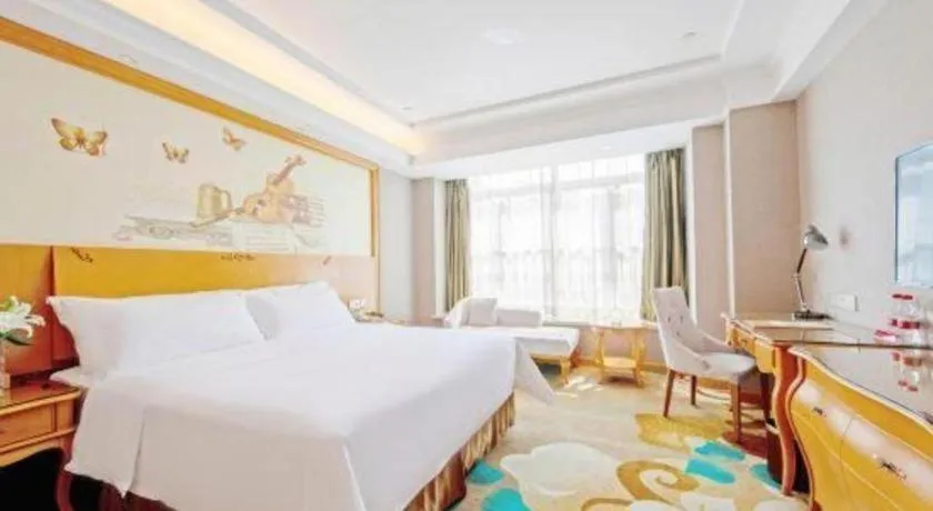 Bed in Vienna Hotel Guangdong Zhongshan Ancient Town Haizhou