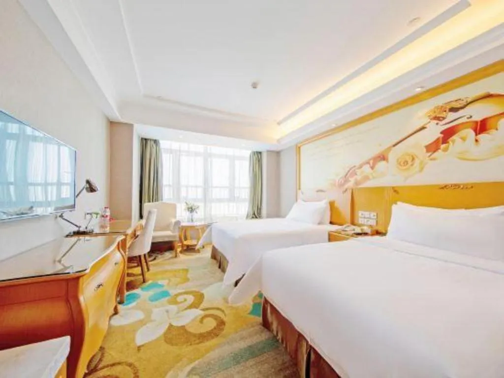 Bed in Vienna Hotel Guangdong Zhongshan Ancient Town Haizhou