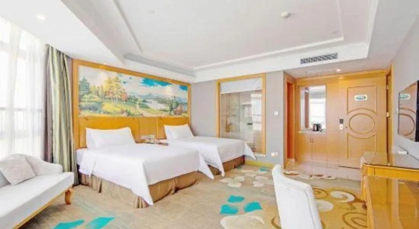 Bed in Vienna Hotel Guangdong Zhongshan Ancient Town Haizhou