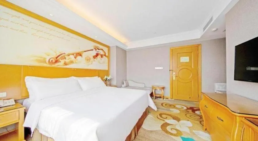 Bed in Vienna Hotel Guangdong Zhongshan Ancient Town Haizhou