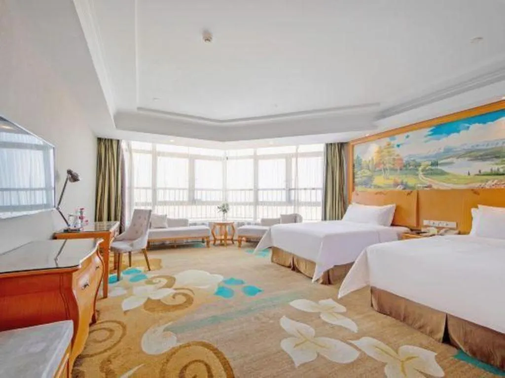 Bed in Vienna Hotel Guangdong Zhongshan Ancient Town Haizhou