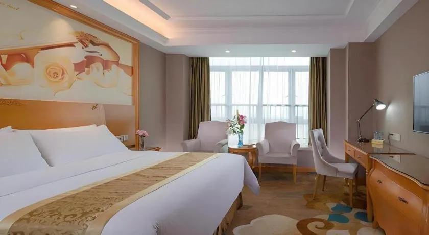 Bed in Vienna Hotel Guangdong Zhongshan Ancient Town Haizhou