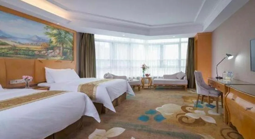 Bed in Vienna Hotel Guangdong Zhongshan Ancient Town Haizhou