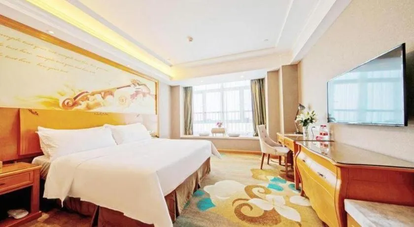 Bed in Vienna Hotel Guangdong Zhongshan Ancient Town Haizhou