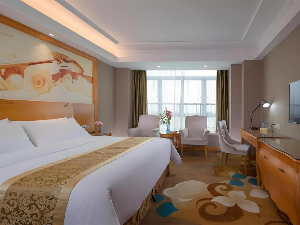 Bed in Vienna Hotel Guangdong Zhongshan Ancient Town Haizhou