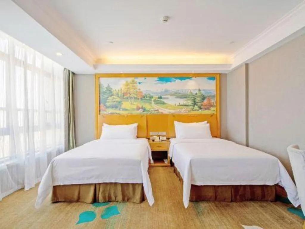 Bed in Vienna Hotel Guangdong Zhongshan Ancient Town Haizhou