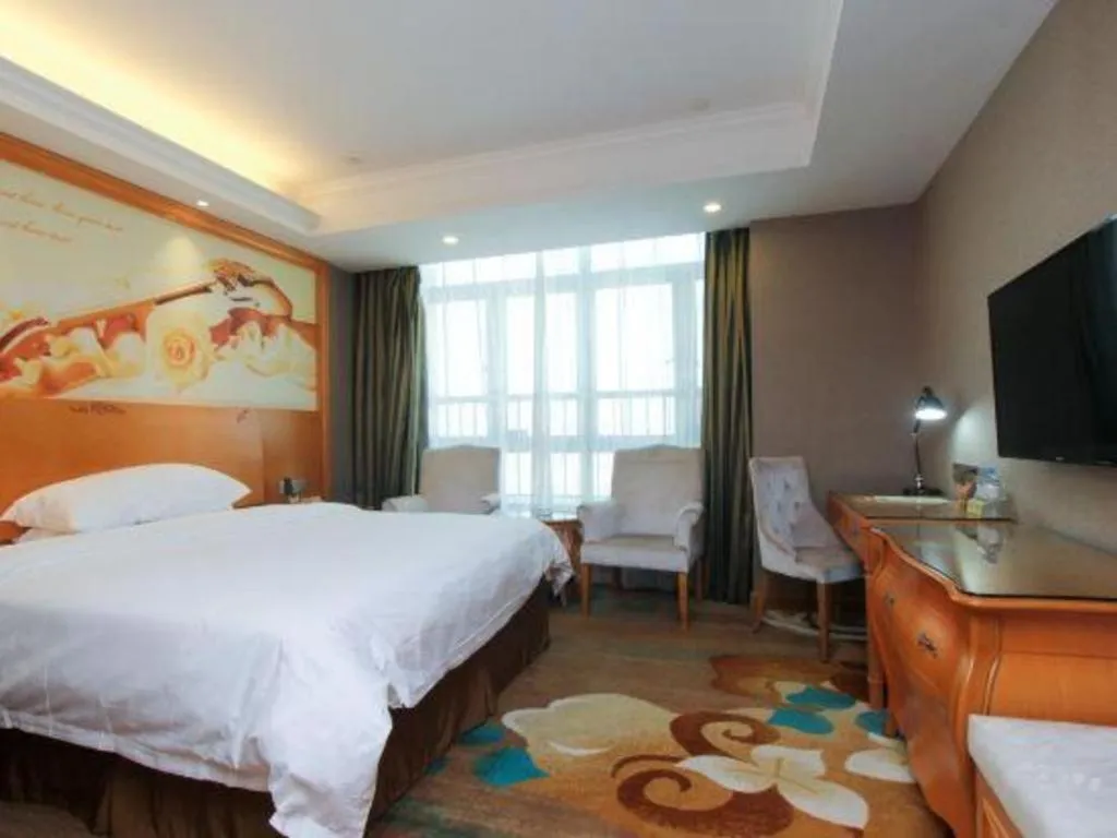 Bed in Vienna Hotel Guangdong Zhongshan Ancient Town Haizhou