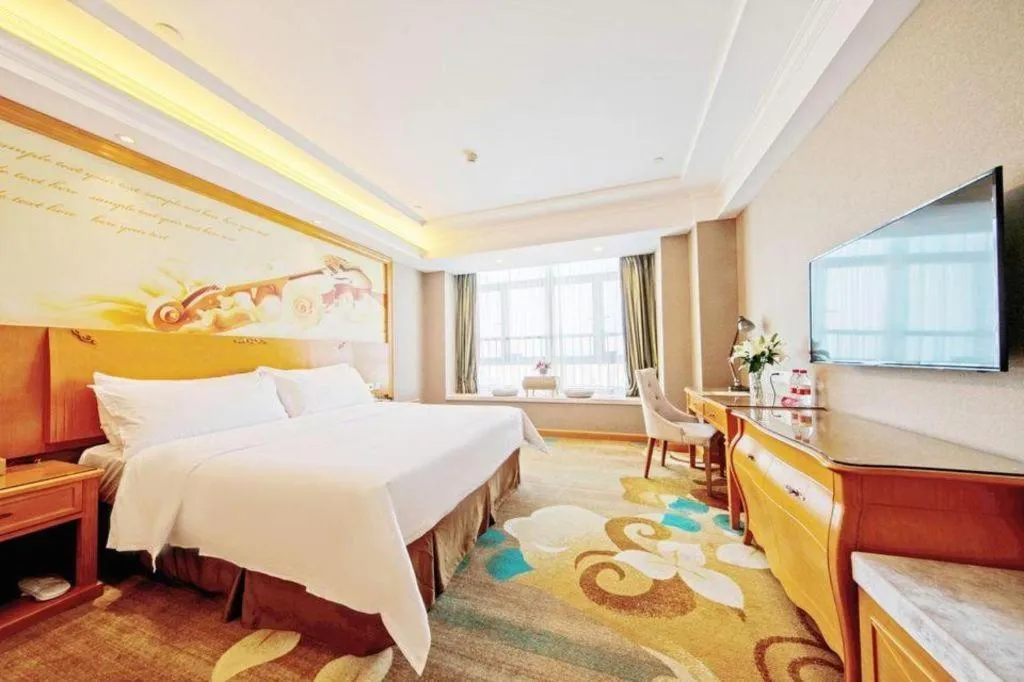 Bed in Vienna Hotel Guangdong Zhongshan Ancient Town Haizhou