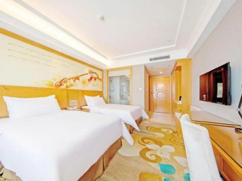 Bed in Vienna Hotel Guangdong Zhongshan Ancient Town Haizhou