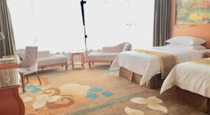 Bed in Vienna Hotel Guangdong Zhongshan Ancient Town Haizhou