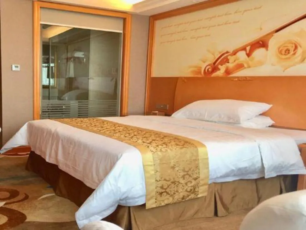 Bed in Vienna Hotel Guangdong Zhongshan Ancient Town Haizhou