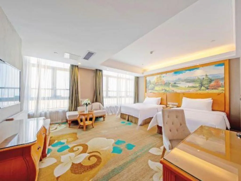 Bed in Vienna Hotel Guangdong Zhongshan Ancient Town Haizhou