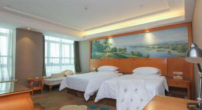 Bed in Vienna Hotel Guangdong Zhongshan Ancient Town Haizhou