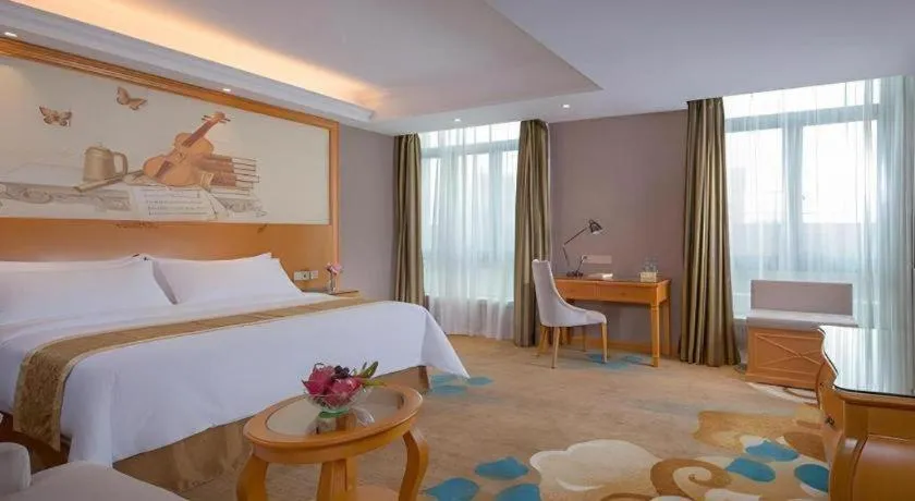 Bed in Vienna Hotel Guangdong Zhongshan Ancient Town Haizhou