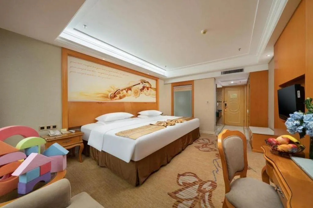 Bed in Vienna Hotel Nanning Anji Wanda 33rd Middle School Metro Station