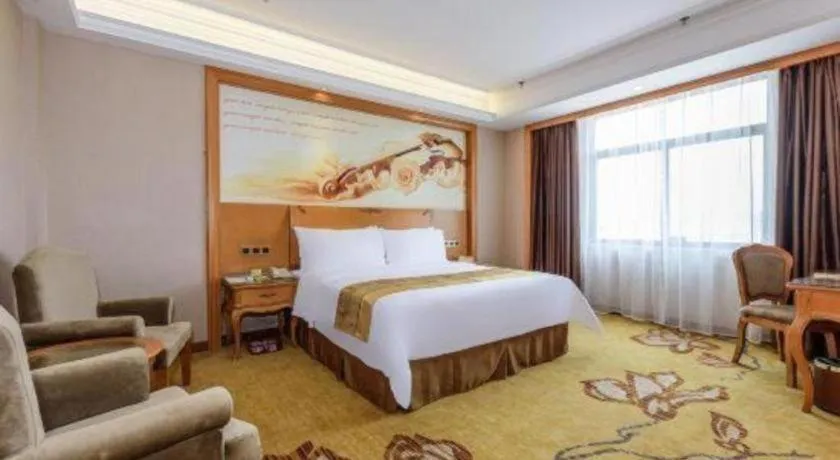 Bed in Vienna Hotel Nanning Anji Wanda 33rd Middle School Metro Station