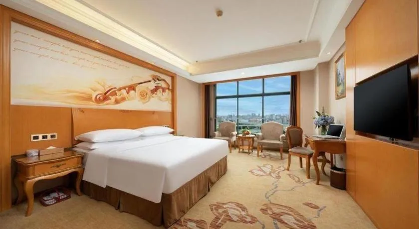 Bed in Vienna Hotel Nanning Anji Wanda 33rd Middle School Metro Station