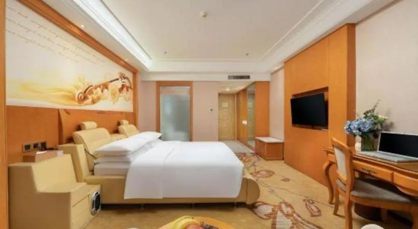Bed in Vienna Hotel Nanning Anji Wanda 33rd Middle School Metro Station
