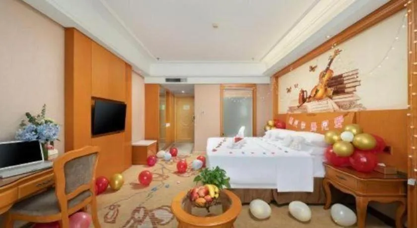 Bed in Vienna Hotel Nanning Anji Wanda 33rd Middle School Metro Station