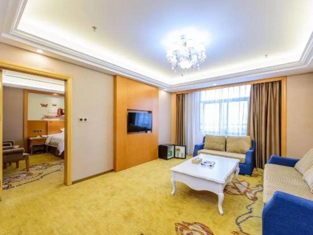 Bed in Vienna Hotel Nanning Anji Wanda 33rd Middle School Metro Station