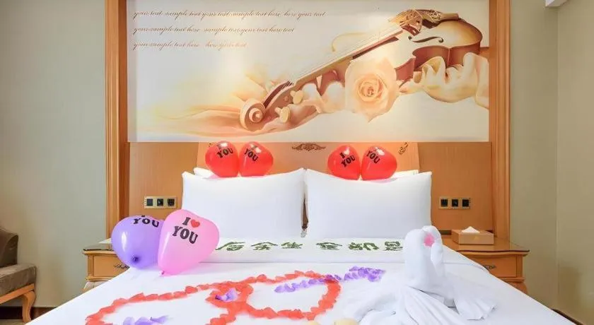 Bed in Vienna Hotel Nanning Anji Wanda 33rd Middle School Metro Station