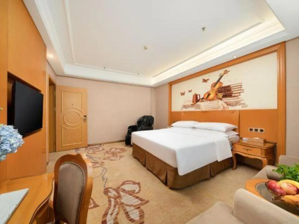 Bed in Vienna Hotel Nanning Anji Wanda 33rd Middle School Metro Station