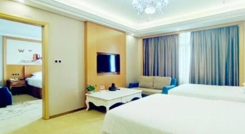 Bed in Vienna Hotel Nanning Anji Wanda 33rd Middle School Metro Station