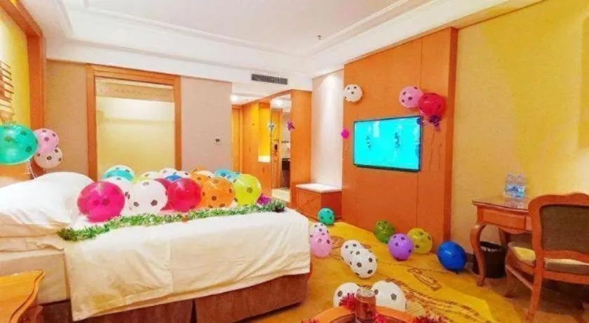 Bed in Vienna Hotel Nanning Anji Wanda 33rd Middle School Metro Station