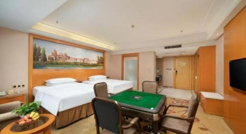 Bed in Vienna Hotel Nanning Anji Wanda 33rd Middle School Metro Station