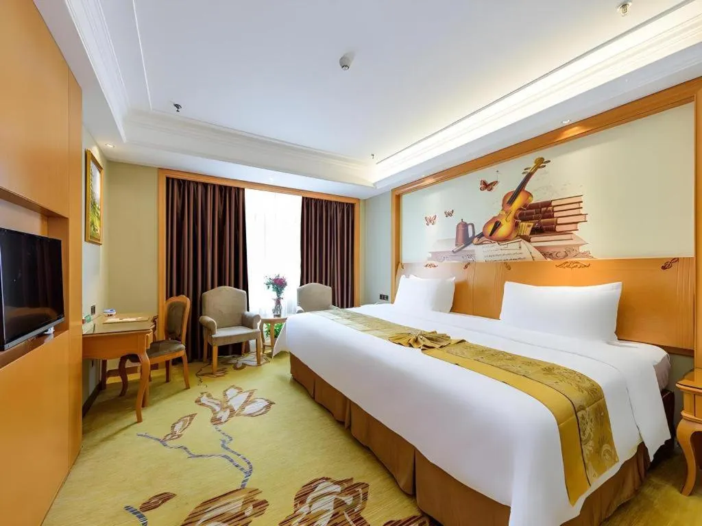 Bed in Vienna Hotel Nanning Anji Wanda 33rd Middle School Metro Station