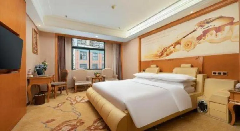 Bed in Vienna Hotel Nanning Anji Wanda 33rd Middle School Metro Station