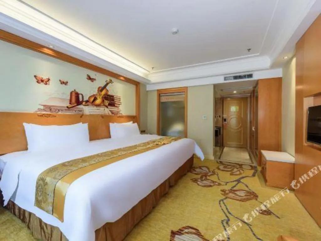 Bed in Vienna Hotel Nanning Anji Wanda 33rd Middle School Metro Station