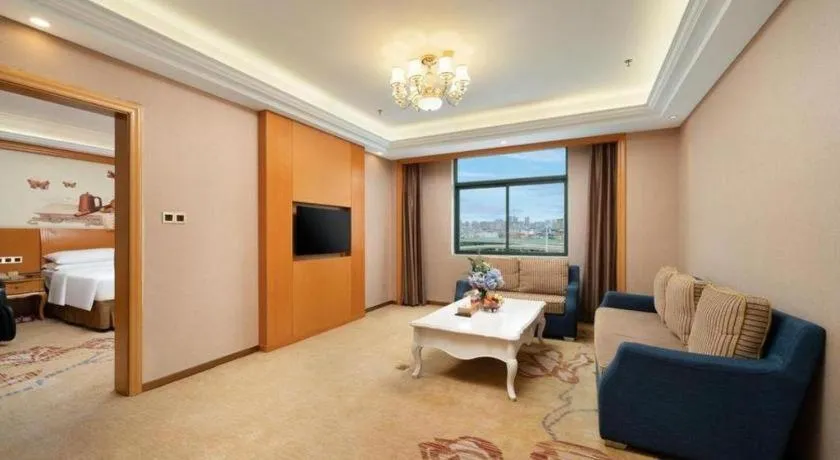 Bed in Vienna Hotel Nanning Anji Wanda 33rd Middle School Metro Station