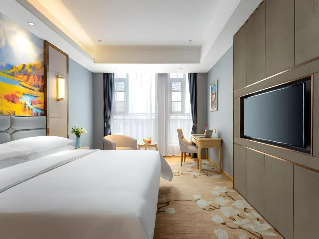 Bed in Vienna Hotel Wuhan Guobo Jiangang Metro Station