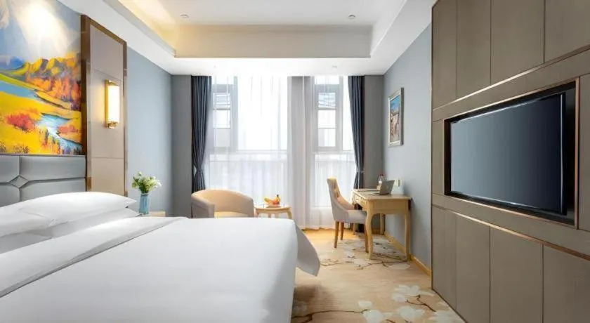 Bed in Vienna Hotel Wuhan Guobo Jiangang Metro Station