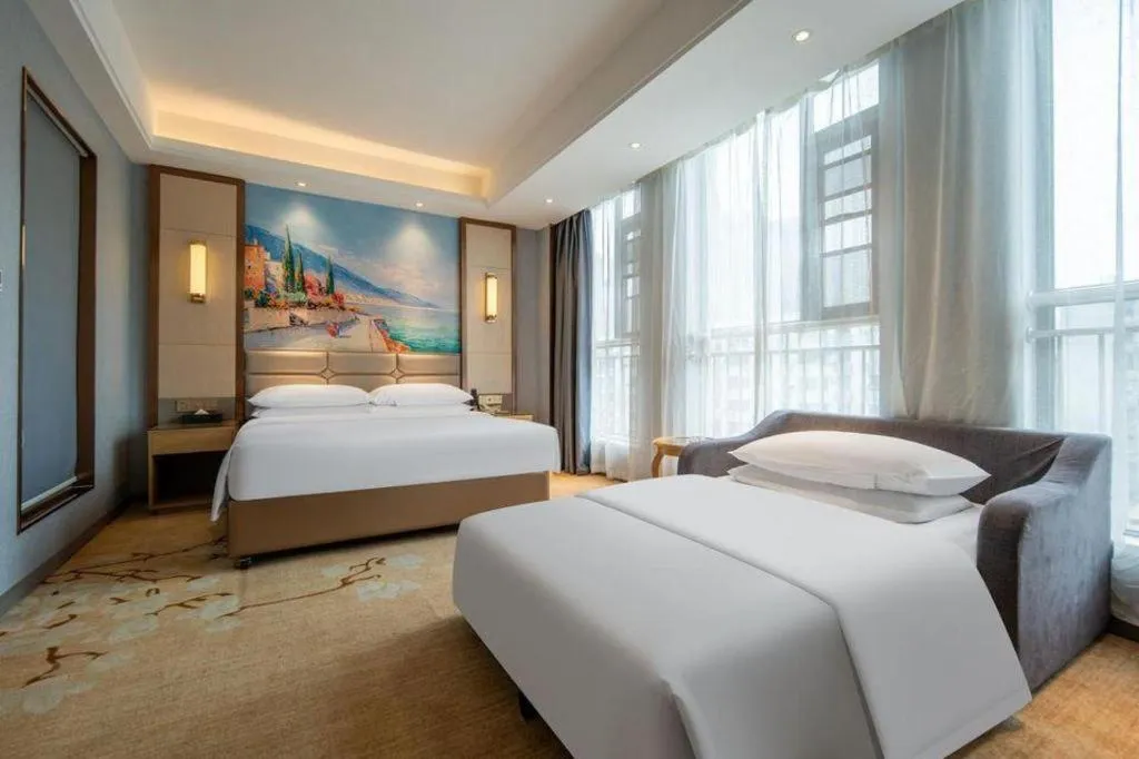 Bed in Vienna Hotel Wuhan Guobo Jiangang Metro Station