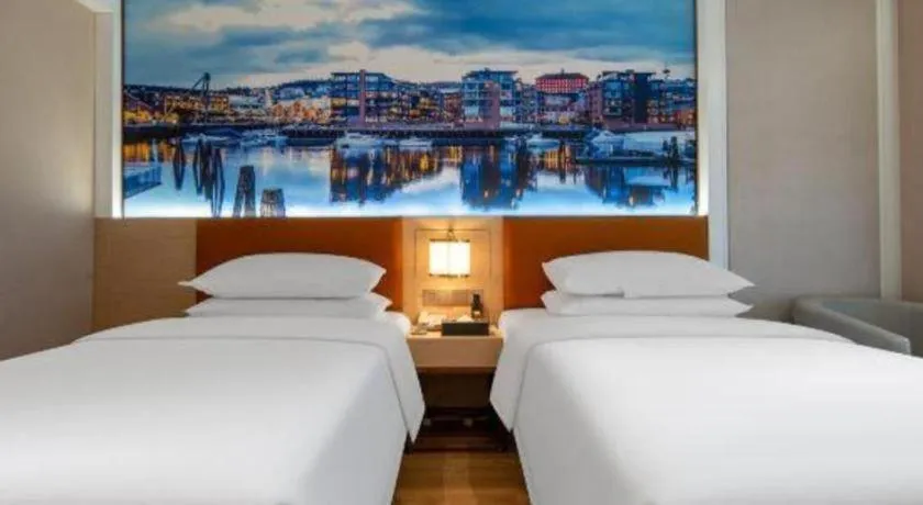 Bed in Vienna Hotel Wuhan Guobo Jiangang Metro Station