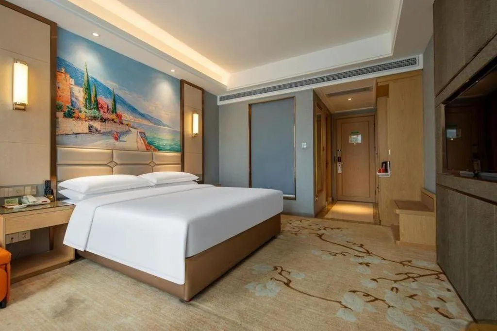 Bed in Vienna Hotel Wuhan Guobo Jiangang Metro Station