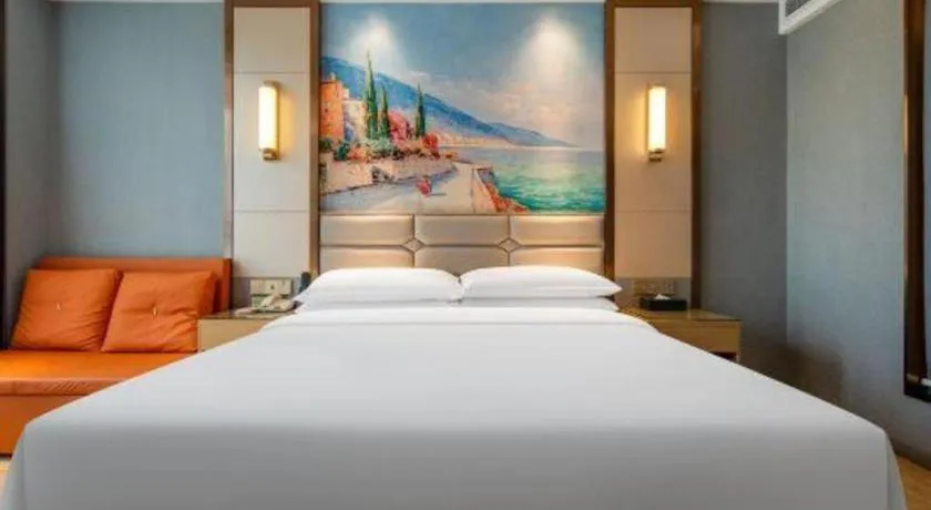 Bed in Vienna Hotel Wuhan Guobo Jiangang Metro Station