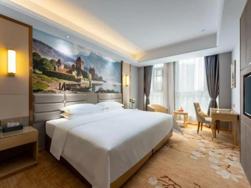 Bed in Vienna Hotel Wuhan Guobo Jiangang Metro Station