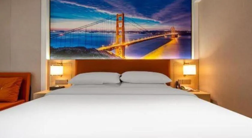 Bed in Vienna Hotel Wuhan Guobo Jiangang Metro Station