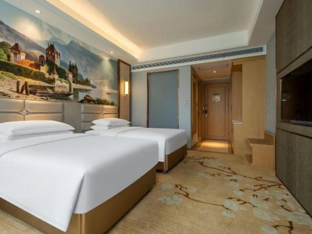 Bed in Vienna Hotel Wuhan Guobo Jiangang Metro Station