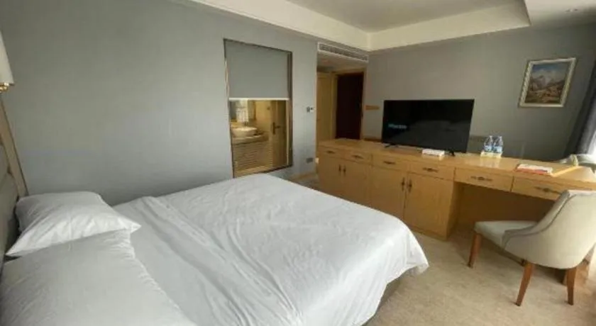 Bed in Vienna Hotel Wuhan Guobo Jiangang Metro Station