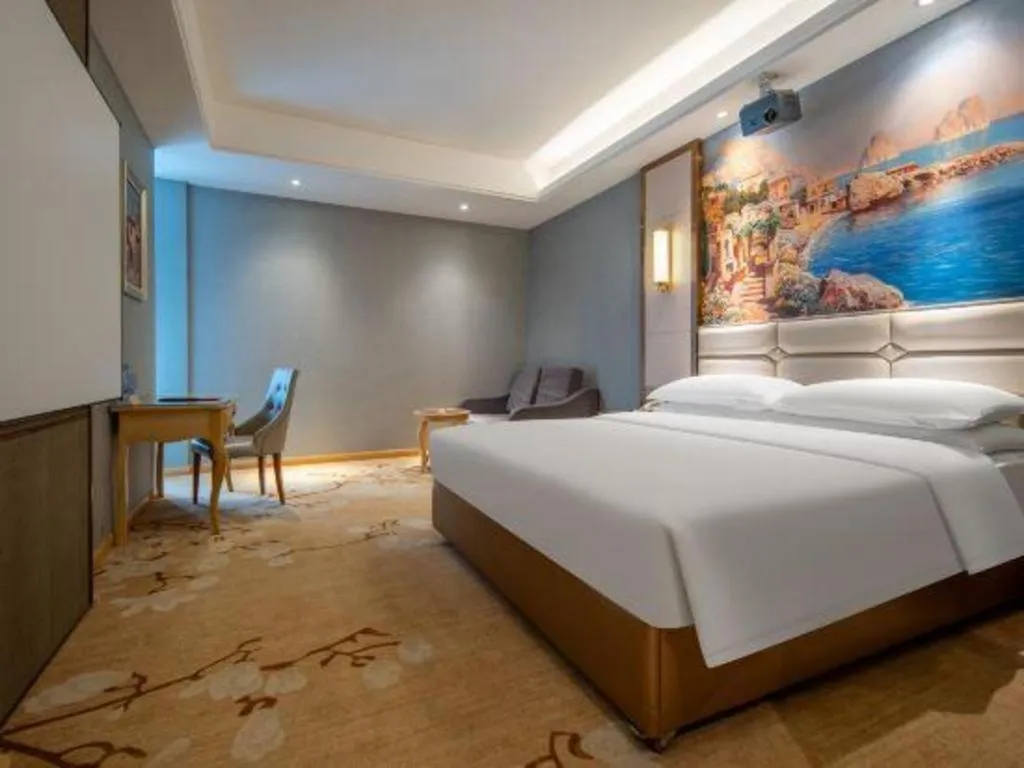 Bed in Vienna Hotel Wuhan Guobo Jiangang Metro Station