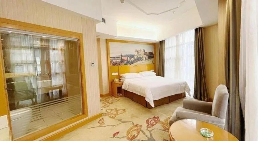 Bed in Vienna Hotel Chongqing Wanzhou Wanda Plaza