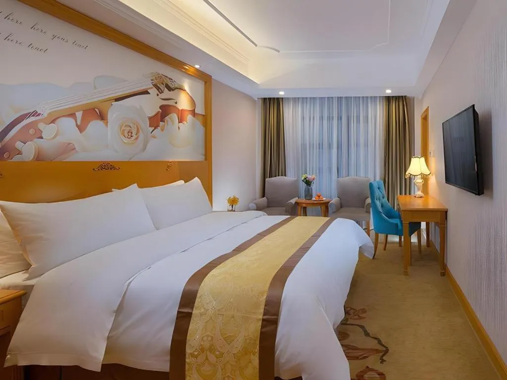 Bed in Vienna Hotel Chongqing Wanzhou Wanda Plaza