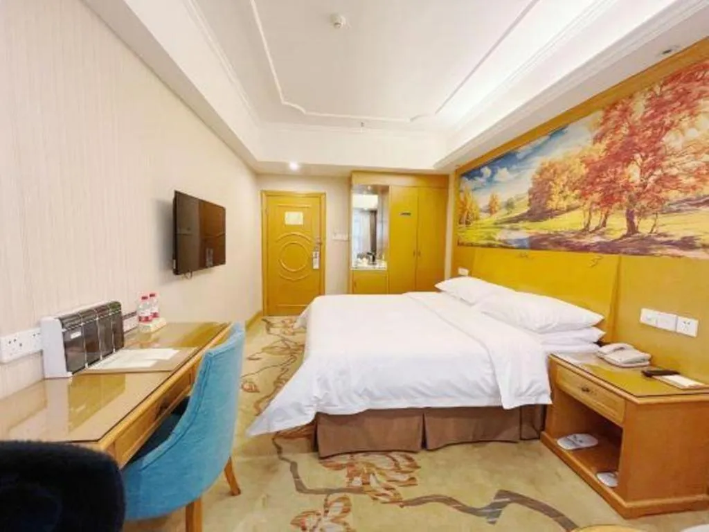 Bed in Vienna Hotel Chongqing Wanzhou Wanda Plaza