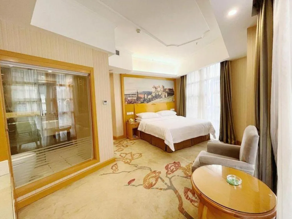 Bed in Vienna Hotel Chongqing Wanzhou Wanda Plaza